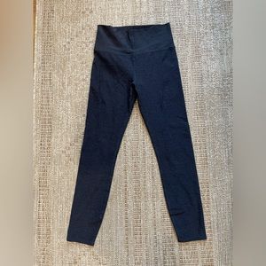Heathered navy blue Vuori leggings